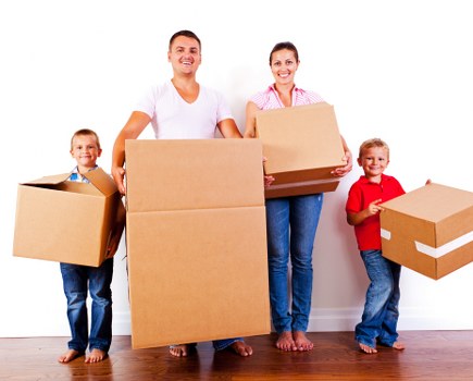 Student removals team helping with boxes and furniture in Streatham