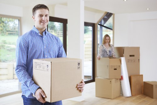 Packed office boxes and furniture ready for relocation in Streatham