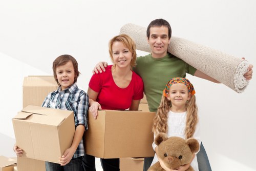 Careful loading of household items into a removals van for a Streatham move