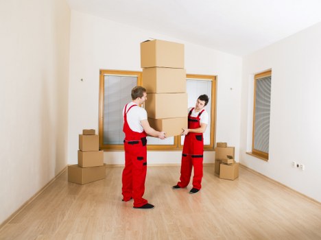 Careful loading of household items for transport around Streatham
