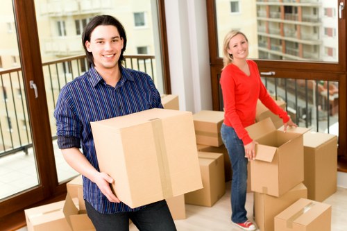 Mover handling furniture carefully during a scheduled relocation